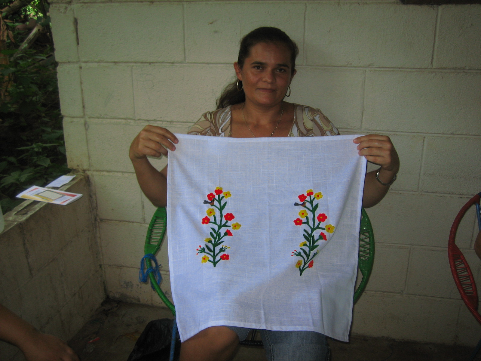 Woman with embroidered napkin